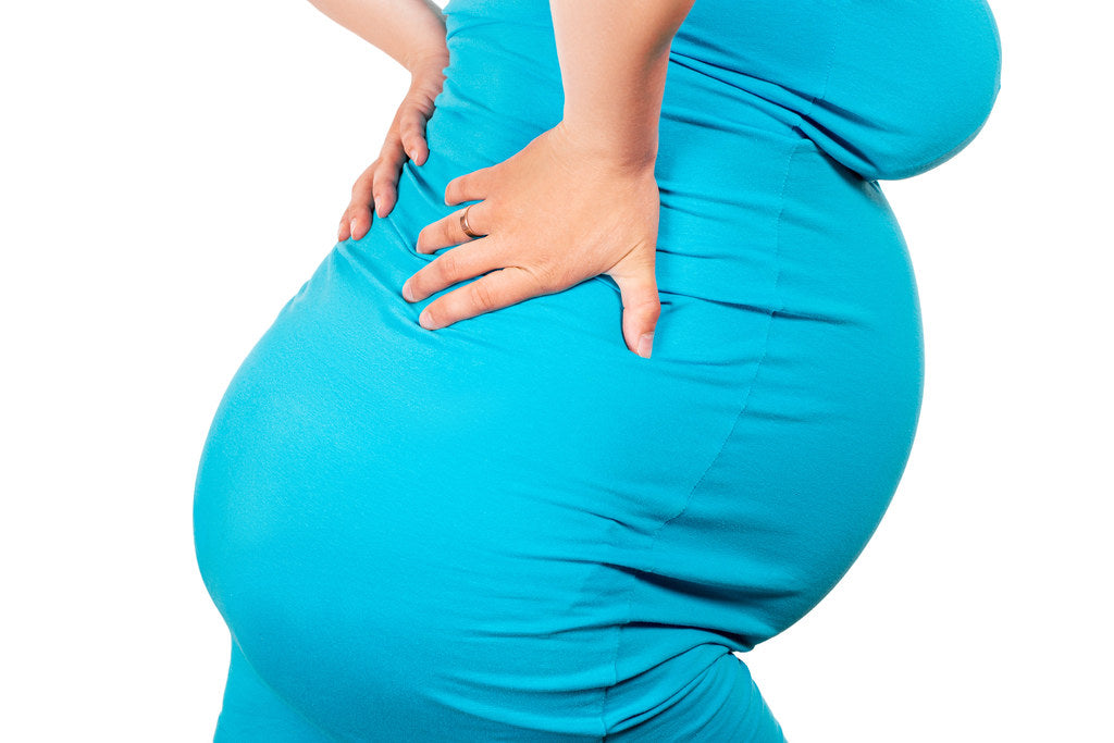 Mal de dos pendant la grossesse: Soulagement de la douleur par le massage